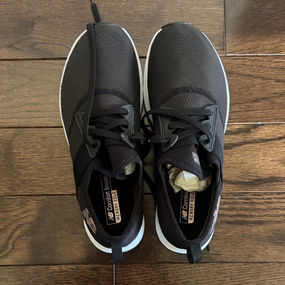 New Balance women’s Black and White Athletic Shoes